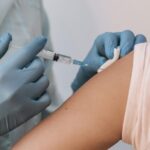 front-view-patient-getting-their-vaccine
