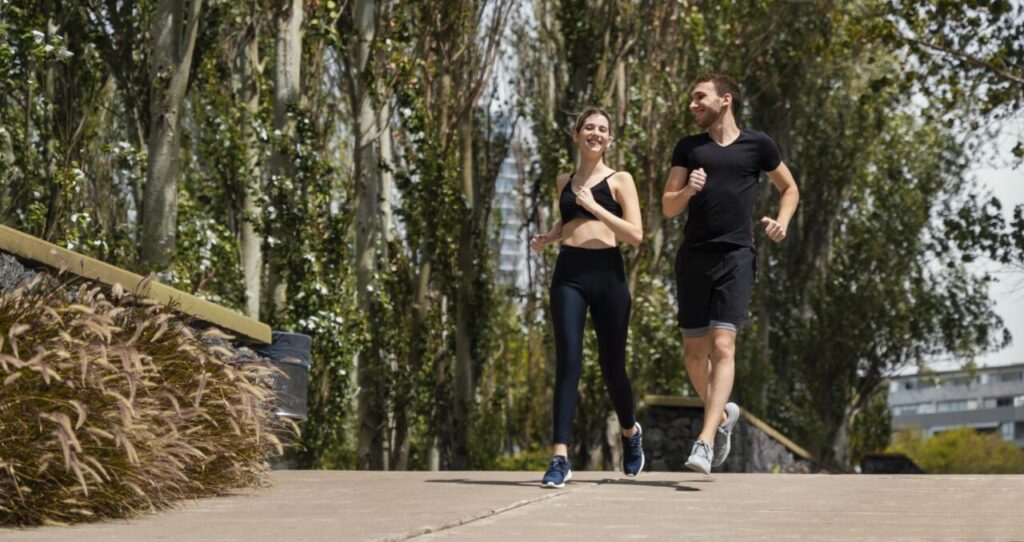 front-view-man-woman-jogging-together-outdoors