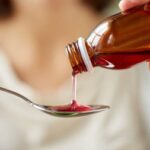 depositphotos_129281668-stock-photo-woman-pouring-medication-from-bottle